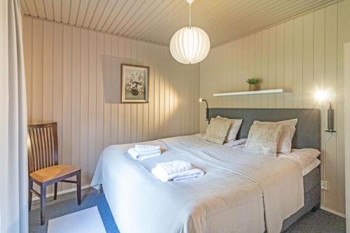 Ένα ή περισσότερα κρεβάτια σε δωμάτιο στο Villa Lepola