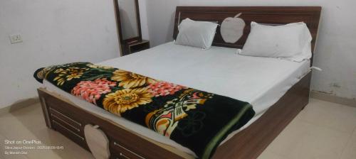 Katil atau katil-katil dalam bilik di Sanwariya Guest House