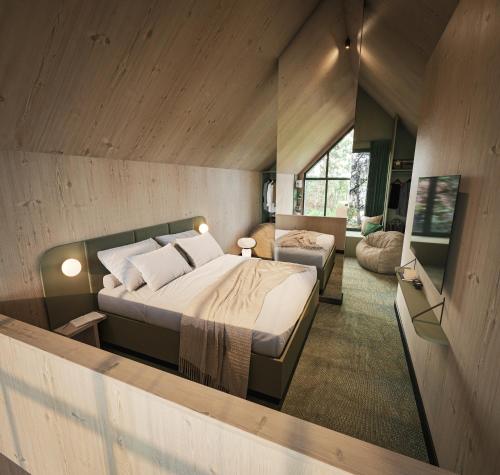 TornowにあるGreen View Tornowの部屋にベッドとソファがある寝室