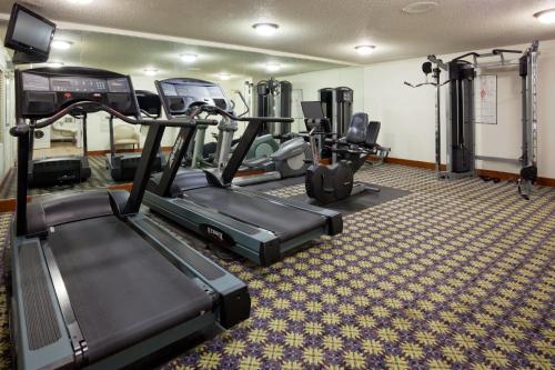 a fitness room with treadmills and a gym at Staybridge Suites Minneapolis-Maple Grove by IHG in Maple Grove