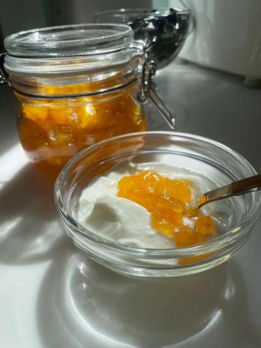 a glass bowl filled with eggs and honey on a counter at Kenting Onehome in Checheng