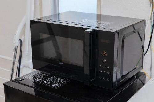 TV a/nebo společenská místnost v ubytování Chihaya Relaxation Haven