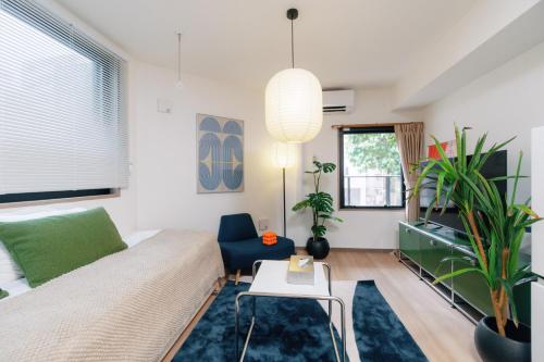 Χώρος καθιστικού στο 寅ホテル新江古田TORA HOTELShinEkoda