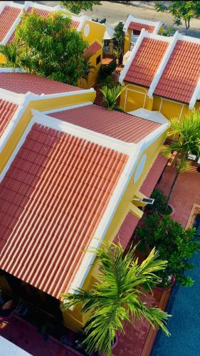 an overhead view of a building with an orange roof at Laa House in Hoi An