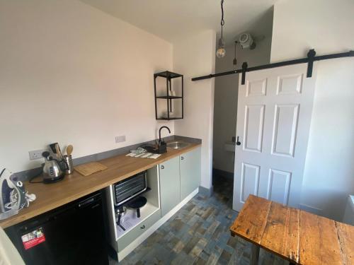 Una cocina o zona de cocina en 2 Newcastle Street
