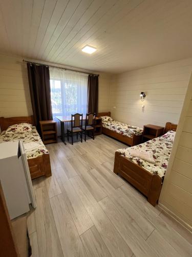 Katil atau katil-katil dalam bilik di Hotels mim