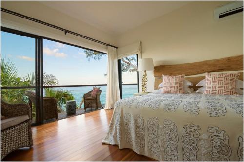 Postel nebo postele na pokoji v ubytování Luxury Villa Sea Monkey