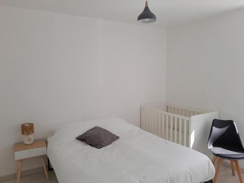 Postel nebo postele na pokoji v ubytování Gîte de l'Aubrigoux - Maison