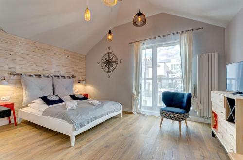 Ein Bett oder Betten in einem Zimmer der Unterkunft Dom & House – Old Town Waterlane