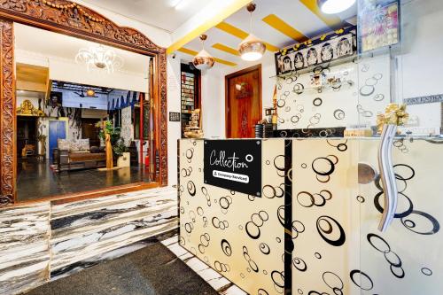 Una cocina o zona de cocina en Super Collection O Puducherry Railway Station Formerly Peace Residecy
