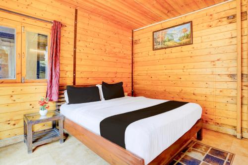 Postel nebo postele na pokoji v ubytování Super Townhouse Morjim
