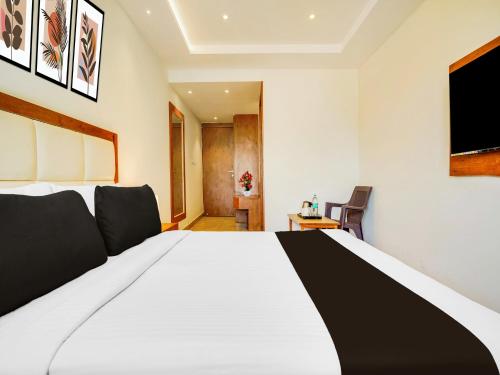 Super Townhouse Ramamurthy Nagar West Formerly Phoenix Hotelにあるベッド