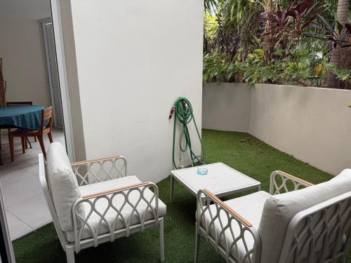 Posezení v ubytování TropiClub Charm appartement avec piscine