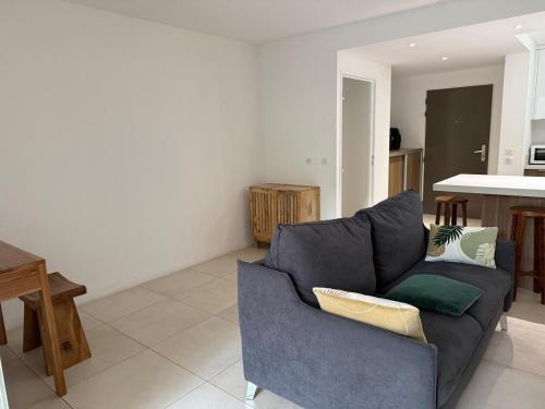 Kuchyň nebo kuchyňský kout v ubytování TropiClub Charm appartement avec piscine