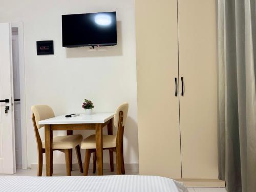 Aerostay Hotelにあるテレビまたはエンターテインメントセンター