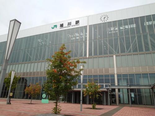 a large building with a clock on the side of it at HOTEL TETORA ASAHIKAWA EKIMAE - Vacation STAY 91497v in Asahikawa