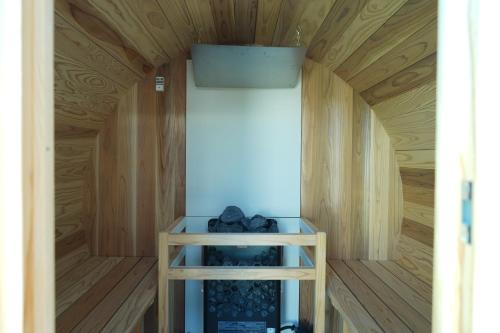 a small room with wooden walls and a ceiling at COCO VILLA 南房総 Dog Stay in Minamiboso