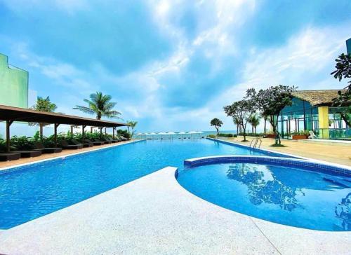 Bazén v ubytování Aria Hotel & Resort Vũng Tàu - Căn Hộ & Villa Mặt Biển Booking 24h nebo v jeho okolí