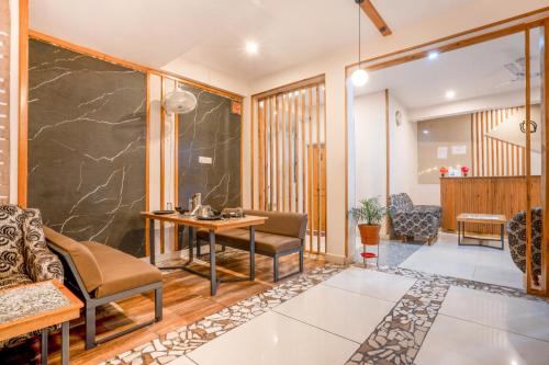 Zona de estar de Deva's Retreat
