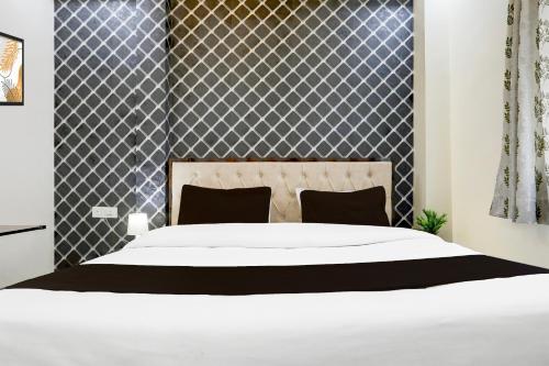 Super Hotel O Kalyanpur Near IIT Kanpurにあるベッド