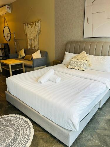 Ένα ή περισσότερα κρεβάτια σε δωμάτιο στο Scarletz Suites KLCC by Dream