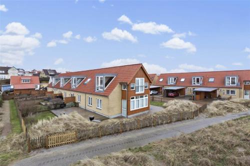 an aerial view of a house with hay at 1167-N-Hundested-Kattegat-Strandhave-38 in Hundested