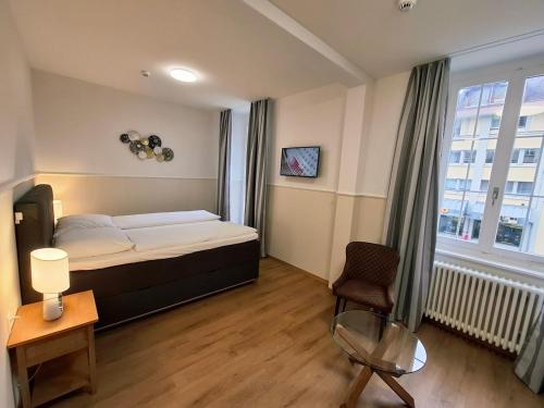 Postel nebo postele na pokoji v ubytování Hotel Central Continental