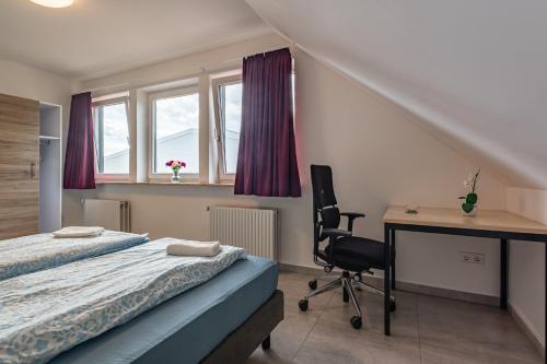Una cama o camas en una habitación de MK Hostel Oyten - free Wifi & Parking - 24h Check-In