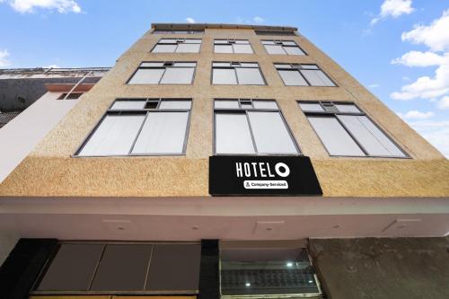 a building with a nordo sign on it at Super Hotel O Mall Road Gwalior formerly Rama inn in Gwalior