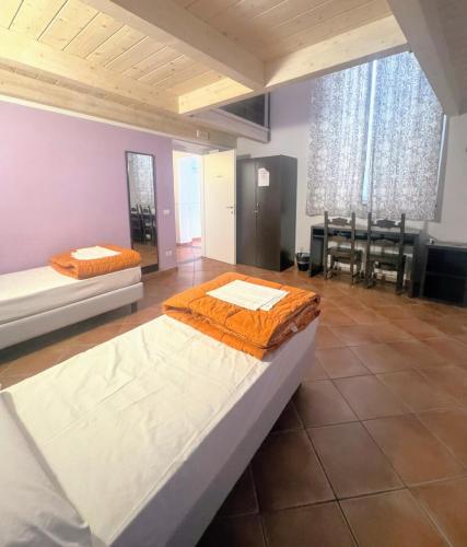 Postel nebo postele na pokoji v ubytování Emerald Palace