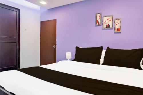 Katil atau katil-katil dalam bilik di Super Hotel O Bopodi Near Pune IT Park