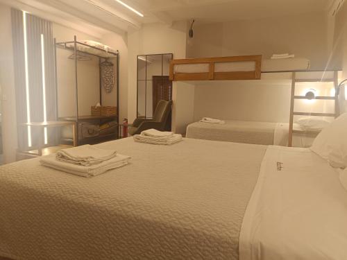 Ένα ή περισσότερα κρεβάτια σε δωμάτιο στο Bacchus Winter Studios