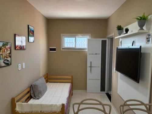 Μια τηλεόραση ή/και κέντρο ψυχαγωγίας στο Residencial Portela 08C