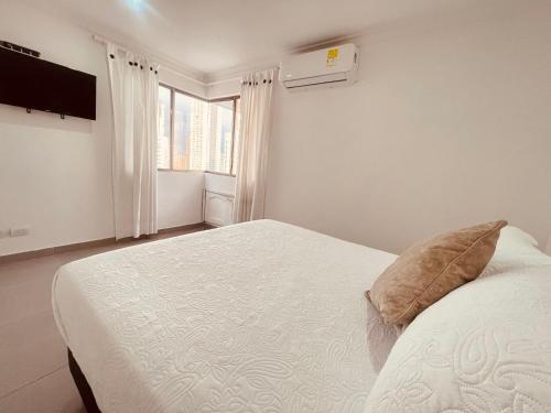 Ένα ή περισσότερα κρεβάτια σε δωμάτιο στο Ocean view apartment in a great location