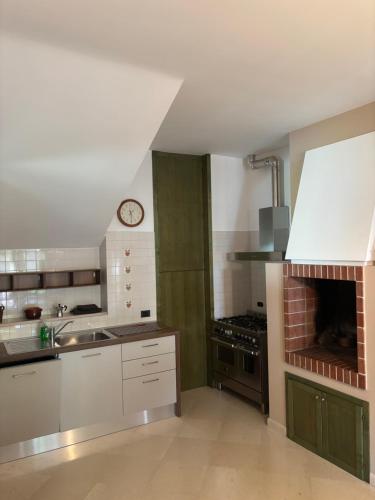 Η κουζίνα ή μικρή κουζίνα στο Casa Itria