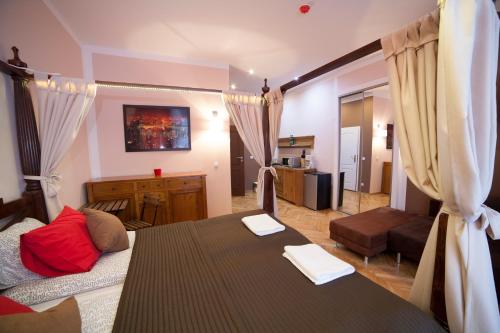 Posteľ alebo postele v izbe v ubytovaní Residence B&B La Fontaine Aparthotel
