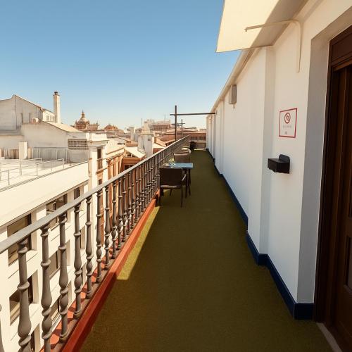 a balcony with a table and chairs on a building at Hotel Plaza in Seville