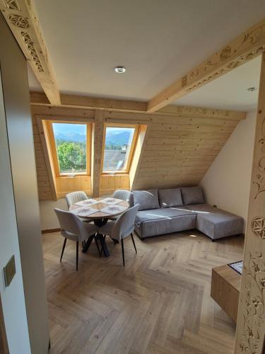 Et opholdsområde på Apartament pod kopieńcem