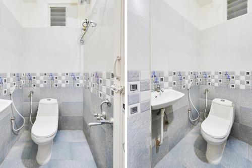 ein Badezimmer mit zwei Toiletten und einem Waschbecken in der Unterkunft Super Hotel O Karakambadi Road Near Leela Mahal Circle in Tirupati