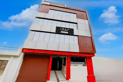 a building with a sign on the side of it at Super Collection O Subedarganj Railway Station Prayagraj in Prayagraj