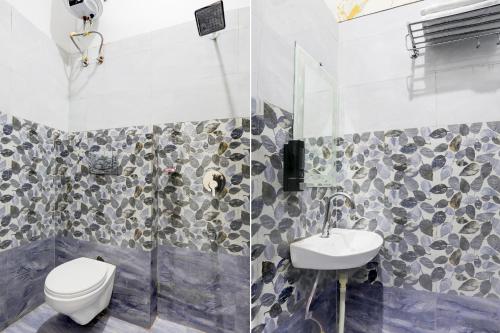 a bathroom with a toilet and a sink at Super Collection O Subedarganj Railway Station Prayagraj in Prayagraj