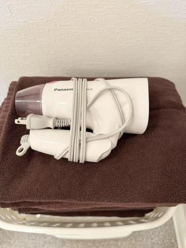 a bundle of items sitting on top of a table at Hotel chen's house - Vacation STAY 42508v in Tokyo
