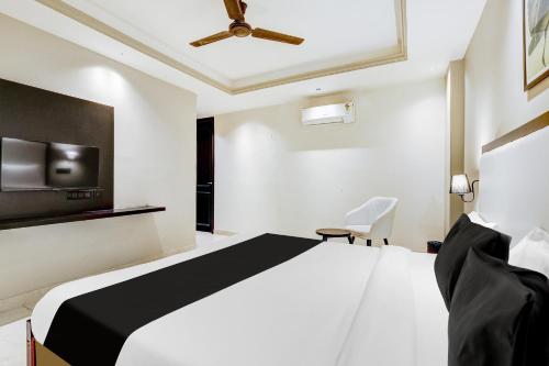 Super Townhouse Oak Udyog Viharにあるベッド