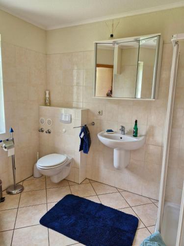 Ένα μπάνιο στο Ferienwohnung Dück