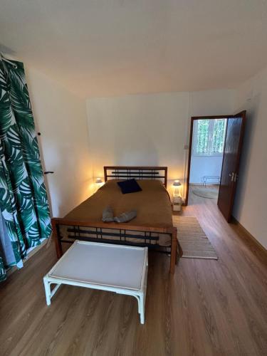Postel nebo postele na pokoji v ubytování Maison avec jardin à Grand Gaube a 1 min de la plage