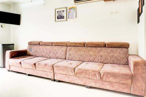 Posezení v ubytování Super Collection O Ubale Nagar