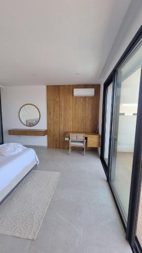 Llit o llits en una habitació de Villa Ryma