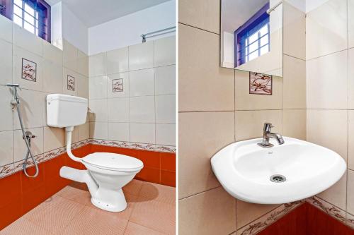 a bathroom with a toilet and a sink at Super Hotel O West Hill near Mietra Hospital in Calicut