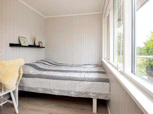 Postel nebo postele na pokoji v ubytování 6 person holiday home in Karrebæksminde-By Traum