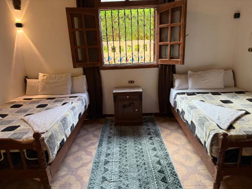 Luxor Villa Hatshepsutにあるベッド